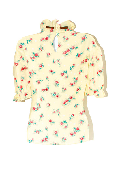 Blusa con lazo y estampado floral